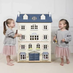 Le Toy Van Palace Doll House -Kids Toy Shop H152 twin girls standing beside palace house08.41.56