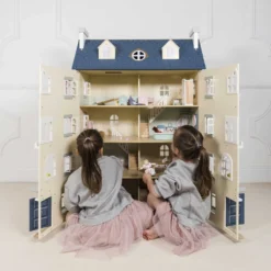 Le Toy Van Palace Doll House -Kids Toy Shop H152 two girls playing with furniture in large palace house08.41.56