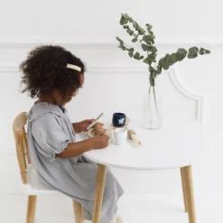 Le Toy Van Dining Set -Kids Toy Shop TV309 dining set girl sitting at table eating meal